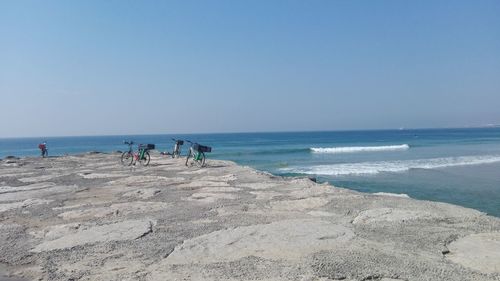 Scenic view of beach against clear sky