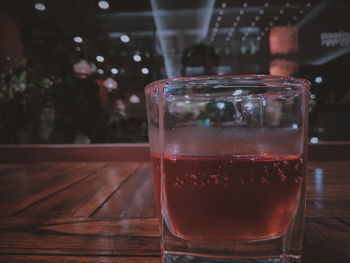 Close-up of beer in glass on table