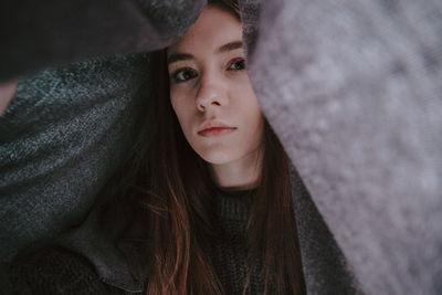 Portrait of woman with blanket