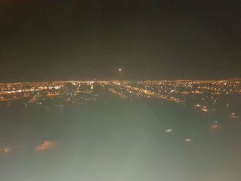 Aerial view of illuminated cityscape