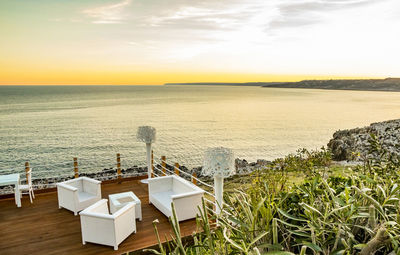 High angle view of sea against sky during sunset