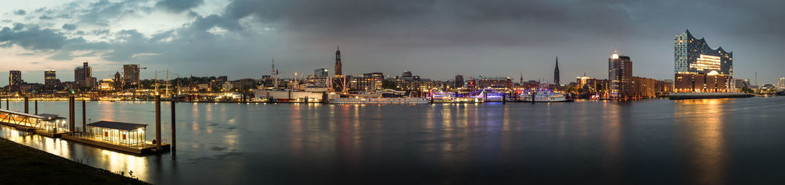 Large panorama from the skyline of hamburg in the early evening with setting sun