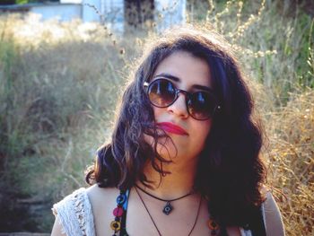 Portrait of young woman in sunglasses