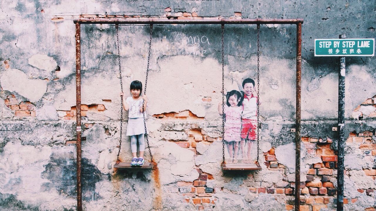 architecture, built structure, wall - building feature, building exterior, weathered, wall, communication, text, old, deterioration, run-down, damaged, abandoned, graffiti, western script, day, rusty, outdoors, brick wall, closed