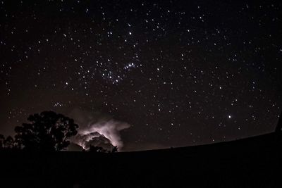 Low angle view of star field against sky at night