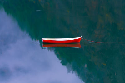 Boat moored in lake