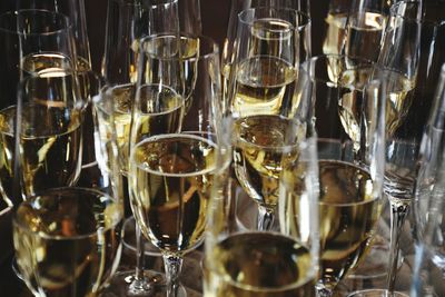 Close-up of wine glasses on table