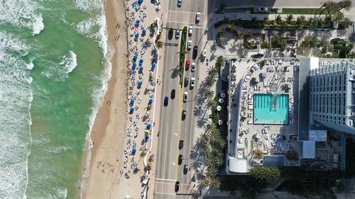 High angle view of road by sea in city