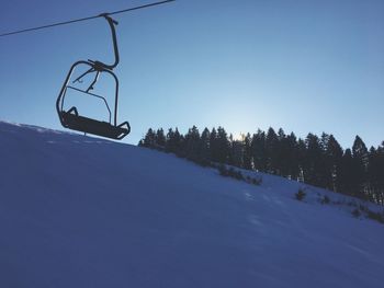 Low angle view of ski lift in winter