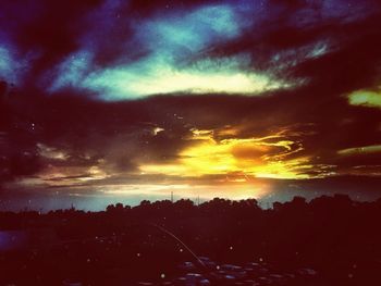 Scenic view of landscape against cloudy sky
