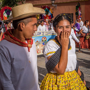 Young couple looking at camera