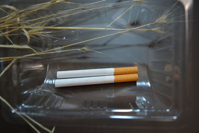 Close-up of cigarette on table