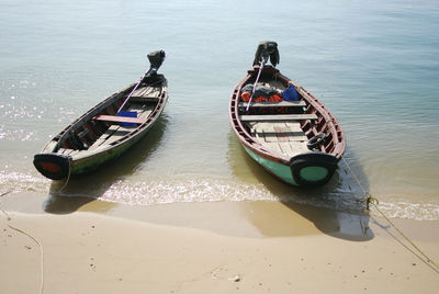 High angle view of boat moored in water