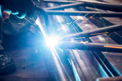 Close-up of worker working in factory