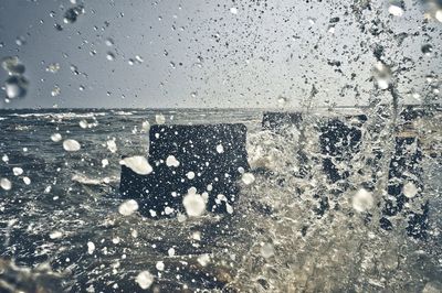 Close-up of raindrops on glass window