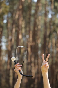 Cropped hand of woman holding hands