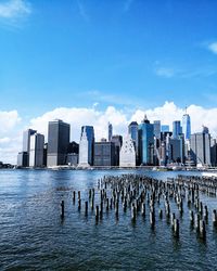 View of cityscape against sea