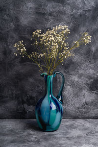 Close-up of flower pot on table