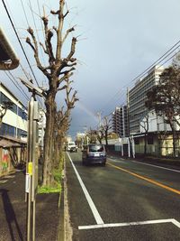 View of city street against sky