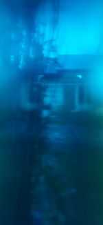 Defocused image of illuminated street at night