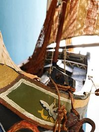 Close-up of boat in sea against sky