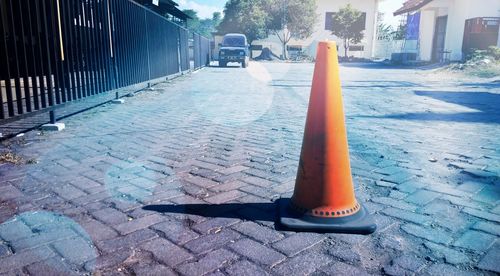 Close-up of fire hydrant on street in city