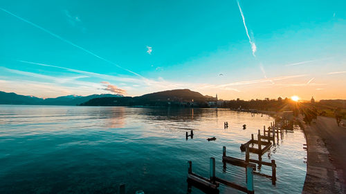 Panoramic view of lake against sky during sunset