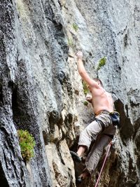 Person standing on rock formation