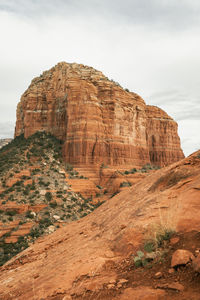 Rock formations on mountain against sky