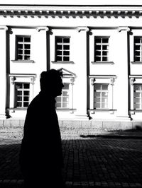 Woman standing in city