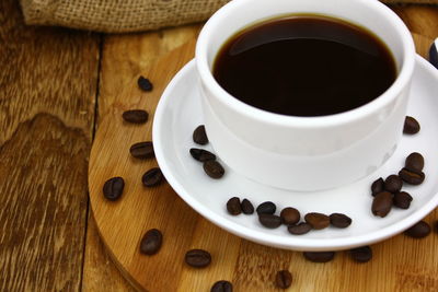 High angle view of coffee cup on table