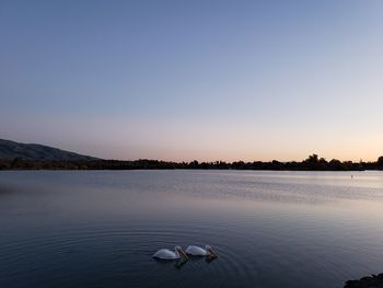 Scenic view of lake against clear sky