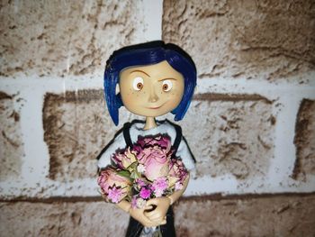 Close-up of toy on wall