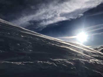 Scenic view of snowcapped mountain against sky