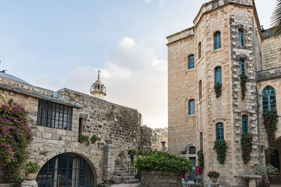 Low angle view of historical building against sky