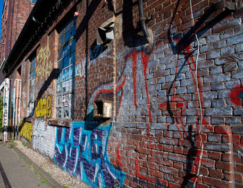 Graffiti on brick wall