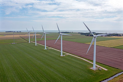 Aerial from wind turbines in the countryside at the ijsselmeer in the netherlands