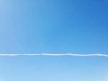 Low angle view of vapor trail in sky