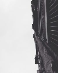 Low angle view of buildings against clear sky