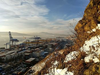 High angle view of buildings against sky during winter