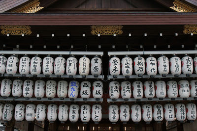 Text on shelf at temple