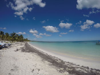 Scenic view of beach against sky