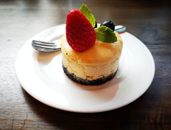 Close-up of cake slice in plate on table