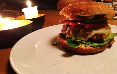 Close-up of burger in plate on table