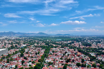 High angle shot of townscape against sky
