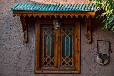 Low angle view of closed door of building