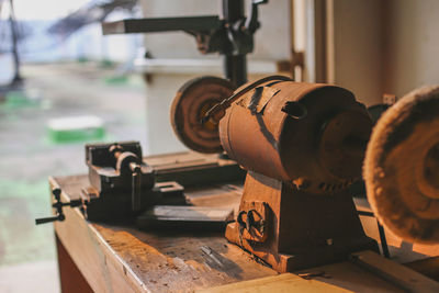 Close-up of old machinery in factory