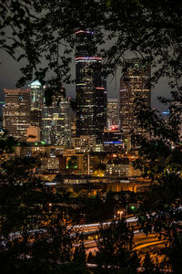 Illuminated buildings in city at night