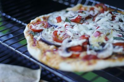 Close-up of meat on barbecue grill