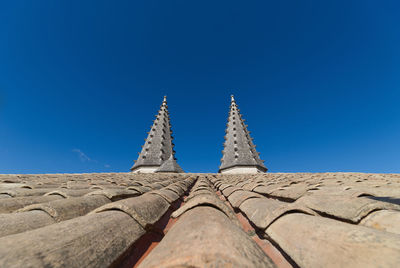 Low angle view of building against blue sky